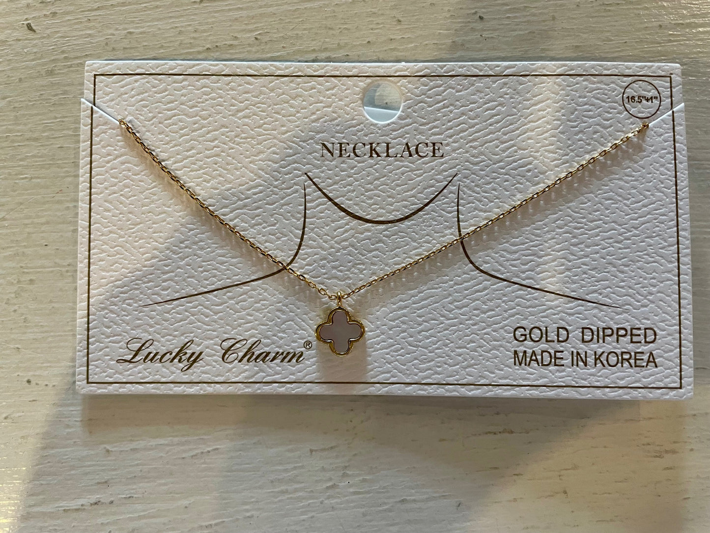 lucky charm gold pendant necklace
