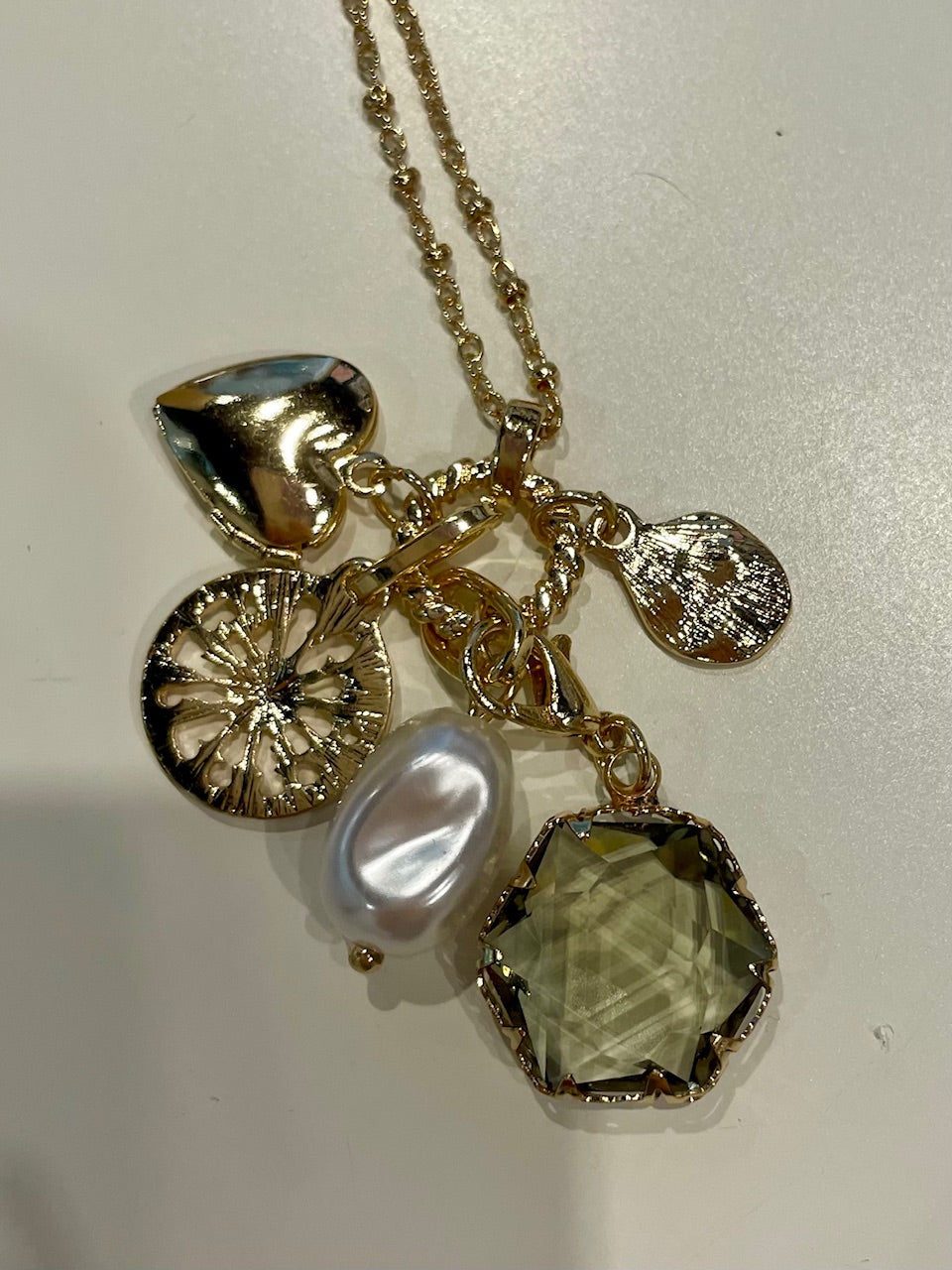 Variety of Charms Long Gold Necklace