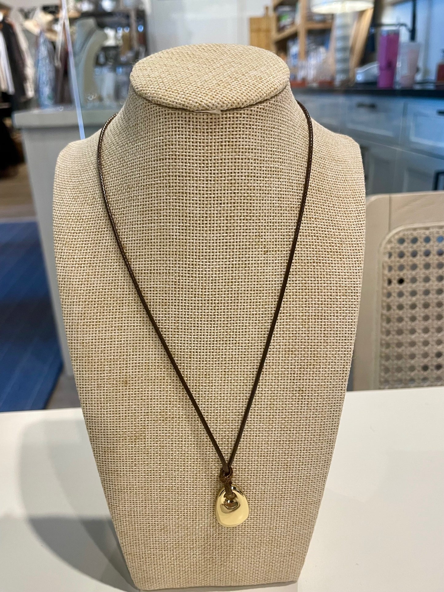 Gold Bean on Leather Necklace