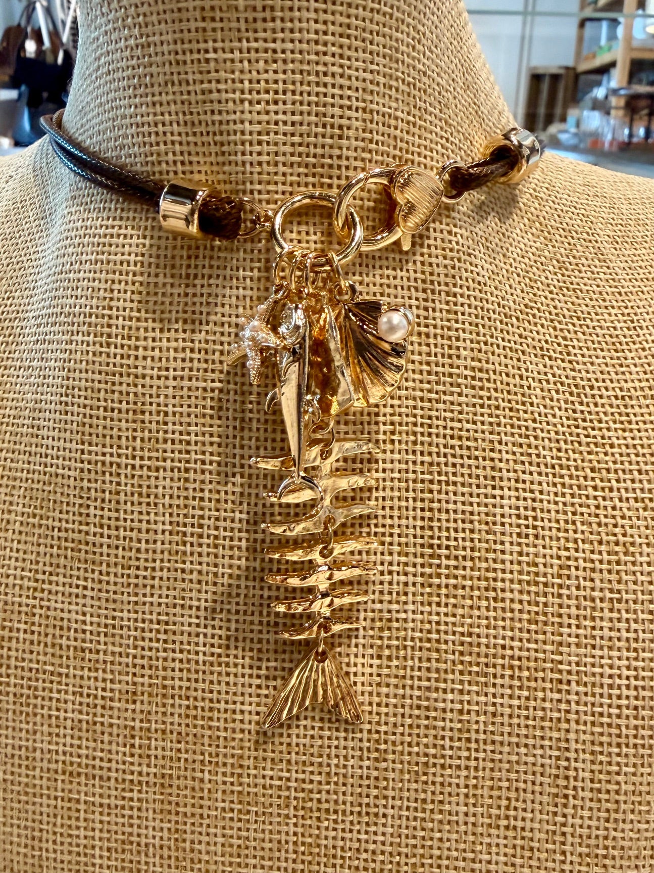 Fish Charms on Brown Leather Necklace